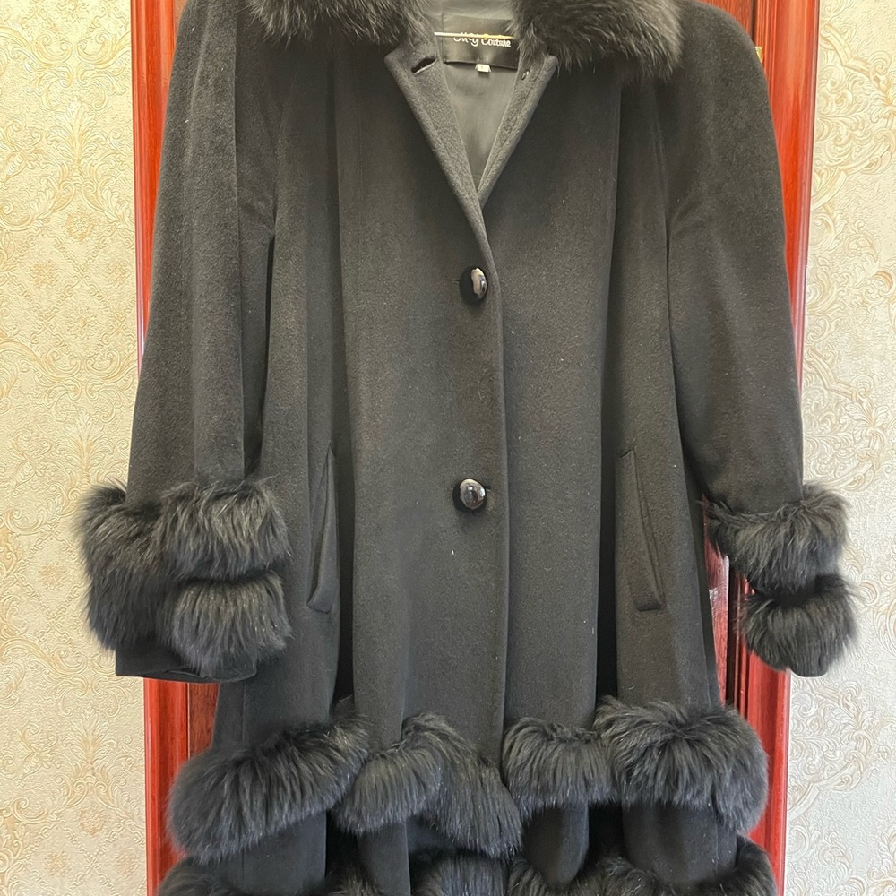 Wool coat with furs around the neck, bottom and sleeves